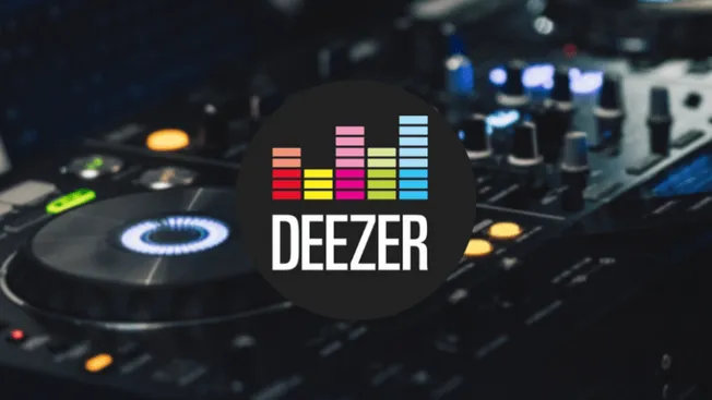 Ableton Live music production software on DJ mixing console with Deezer logo, representing streaming music integration for mu