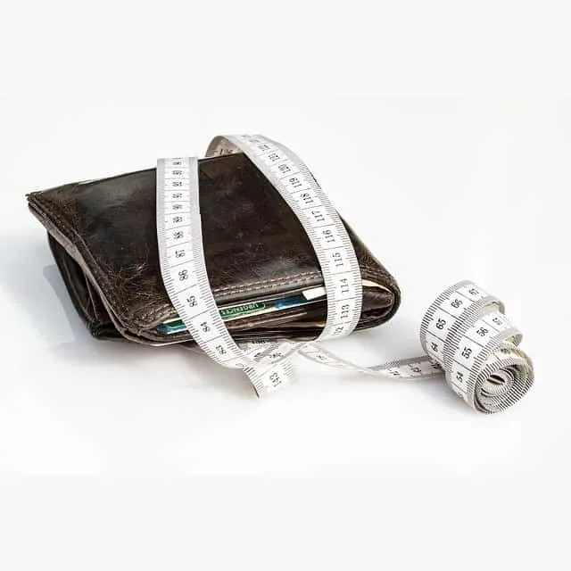 Wallet with measuring tape, financial planning, money management, budgeting tools, personal finance, Hypebot SEO image.