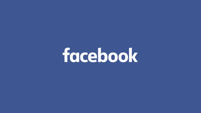 Facebook social media platform logo on blue background.