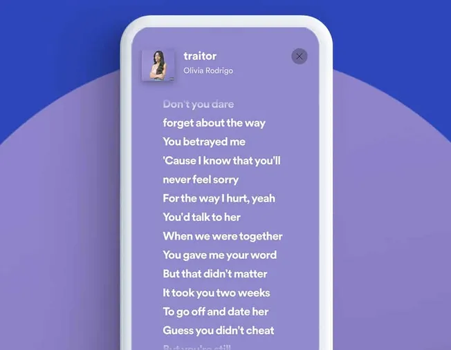 Olivia Rodrigo traitor song lyrics displayed on a smartphone screen, representing music, pop culture, lyrical content, and di