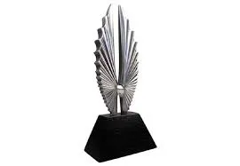 Silver music award trophy with a spiked, eye-catching design on a black base, symbolizing excellence in the music industry. P