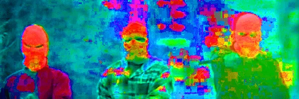 Colorful infrared heat map of three people at a Hypebot music industry event, emphasizing technology and innovation in music