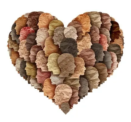 A heart shape made of crumpled paper in various shades of brown, beige, and pink, symbolizing love and unity through diverse