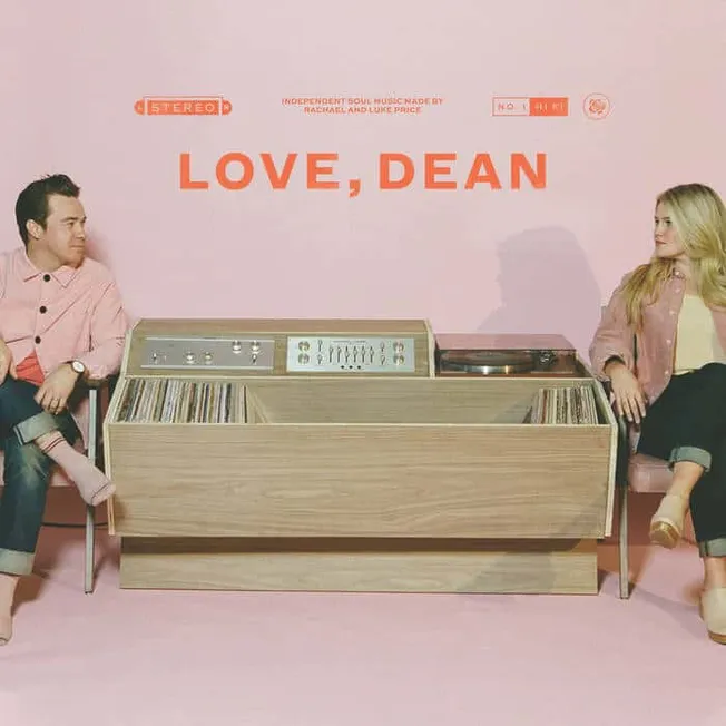 Love dean vinyl record store display with two people sitting on chairs by the record player and vinyl collection, retro 70s s