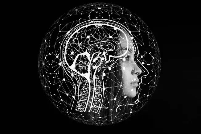 Futuristic digital illustration of a human head profile with neural network overlays and brain anatomy, highlighting AI, neur