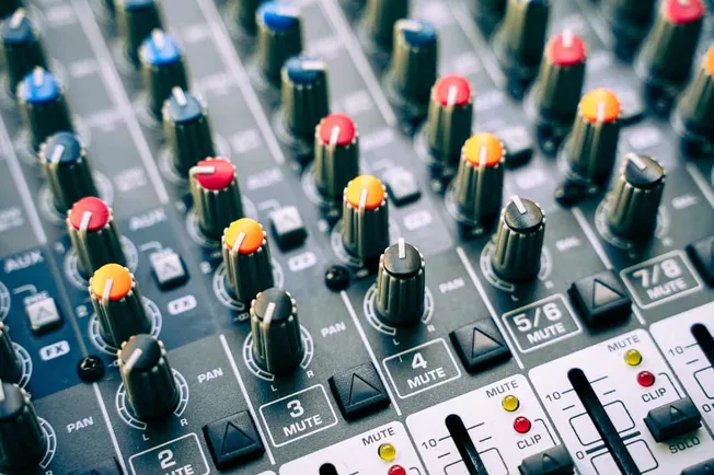 Audio mixing console, audio equipment, professional sound mixer, audio control panel, music production gear, DJ mixing desk,