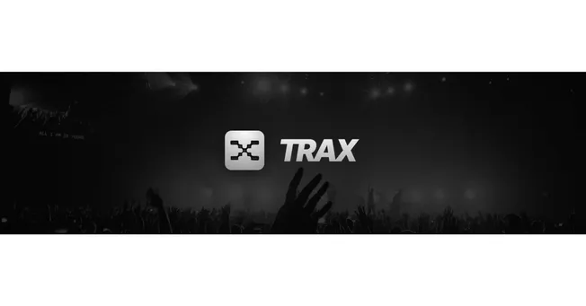 TRAX music software logo at electronic concert, digital DJ equipment, audio production, music streaming, electronic dance mus