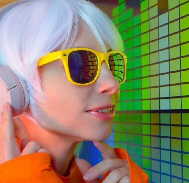 Tech-savvy woman with white hair wearing yellow sunglasses and headphones, vibrant digital music wall background, modern elec