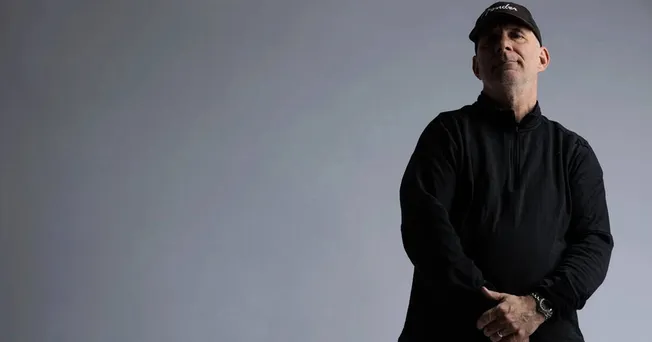 Innovative music industry expert in black attire posing confidently for Hypebot article on music marketing and industry trend