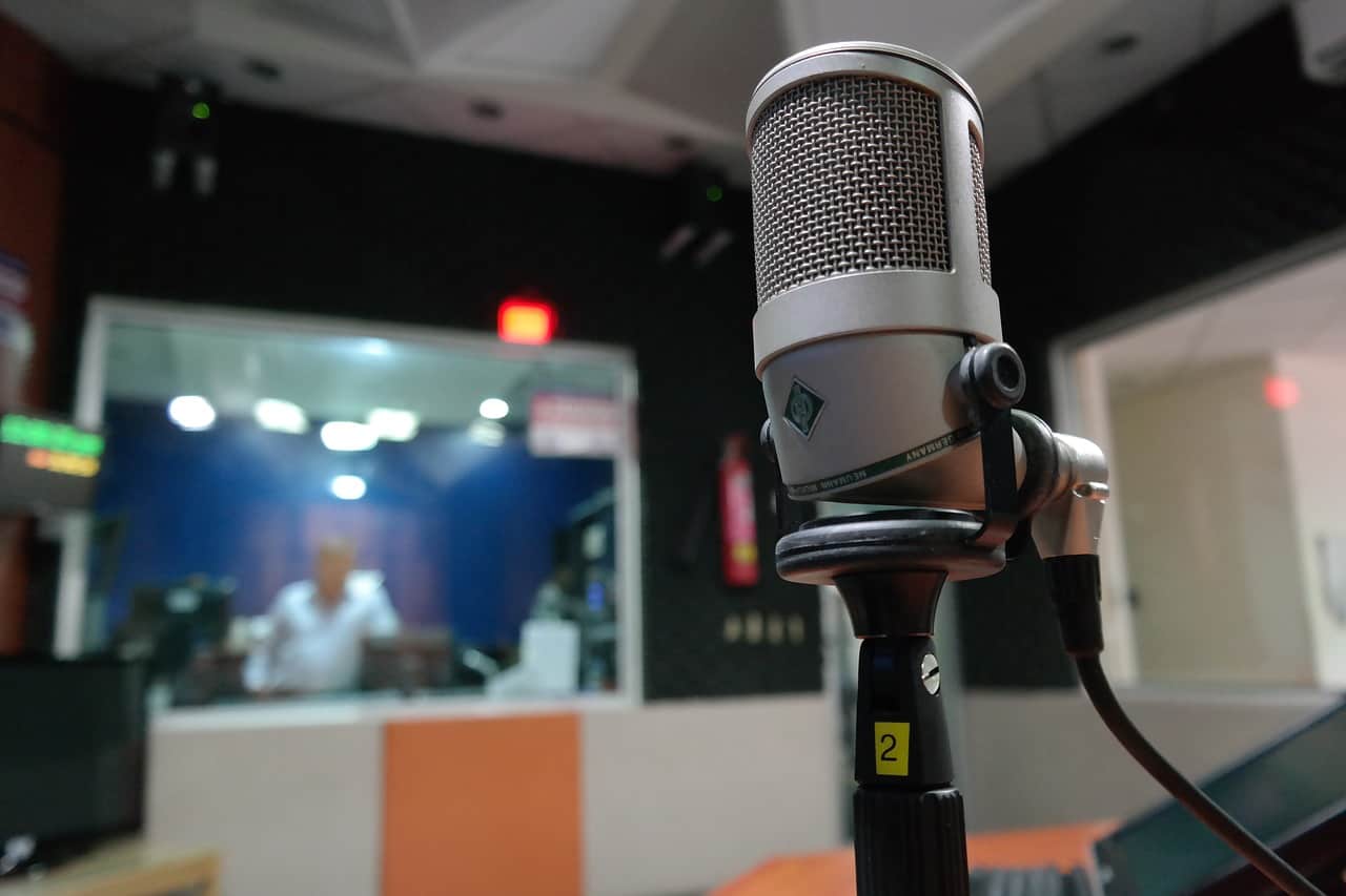 Microphone in a recording studio for podcast or radio production at Hypebot.