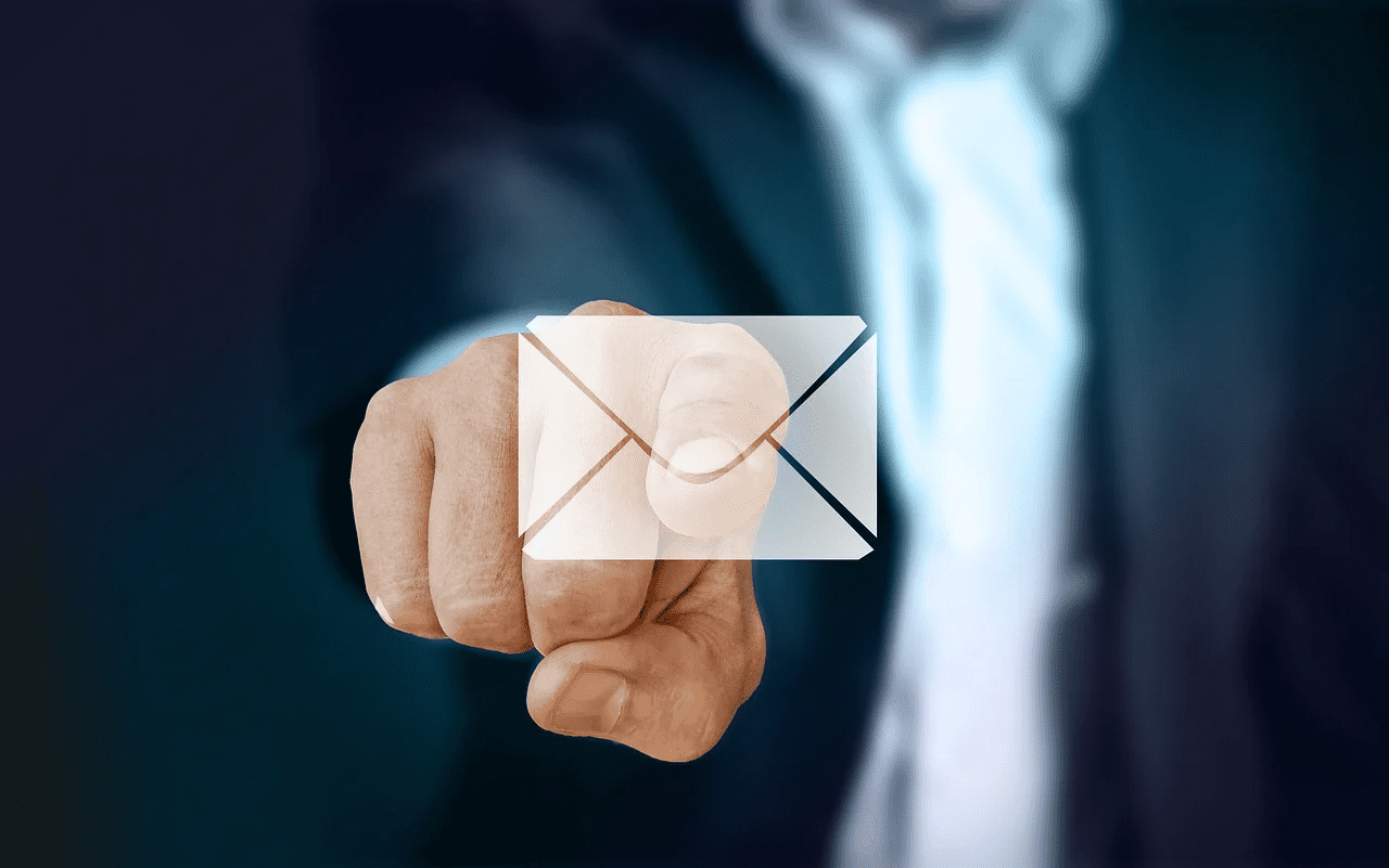 Email marketing, businessman pressing virtual email icon, technology, communication, digital marketing, networking, Hypebot, abstract email symbol, modern business, cyber communication, professional setting.