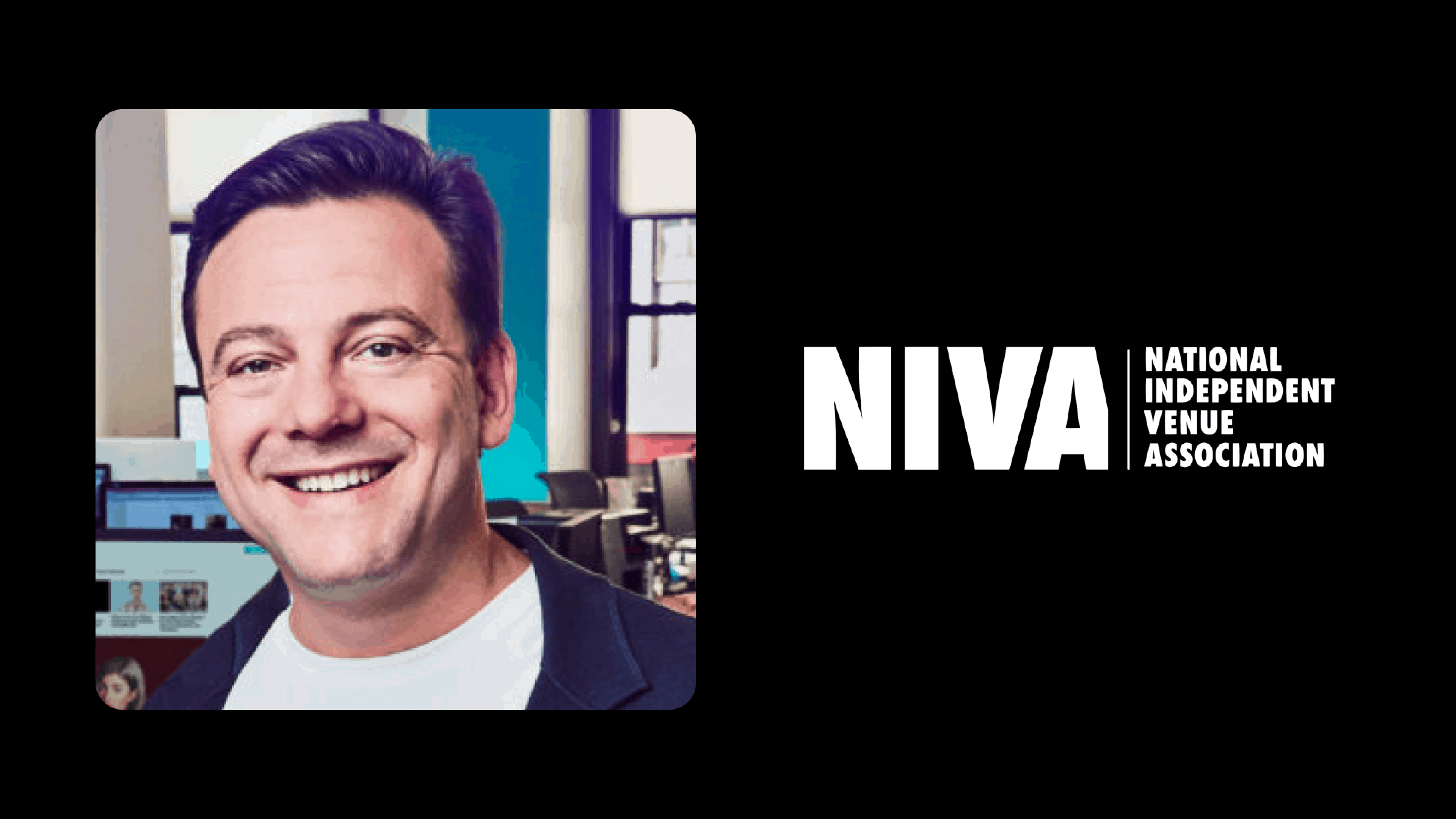 Smiling man at A&R music industry event with NIVA logo in background, representing the National Independent Venue Association, focused on live music venues and industry advocacy.