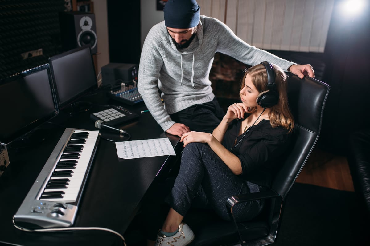 an artist with her music manager