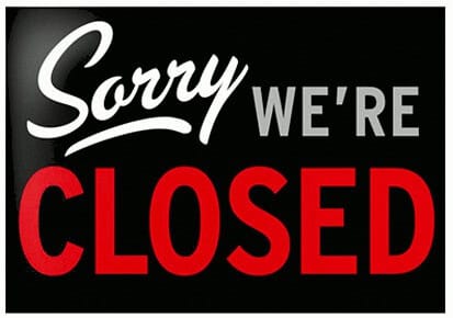Closed sign with "Sorry We're Closed" message, black background, white and red text indicating business closure, commonly used in retail or service establishments.