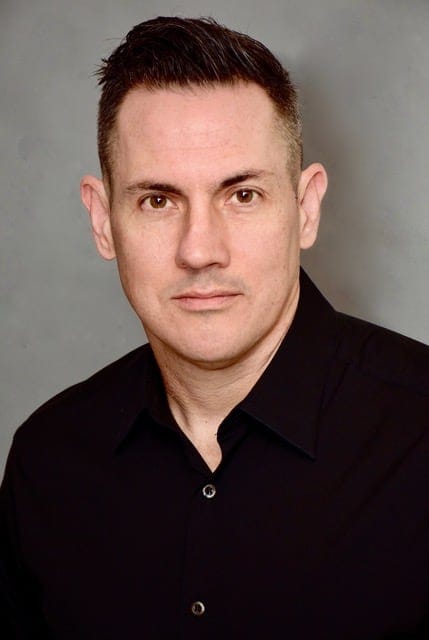 Professional male portrait, music industry expert, media executive, Hypebot, digital marketing, music business, industry analysis, expert interview, music technology, entertainment leadership.