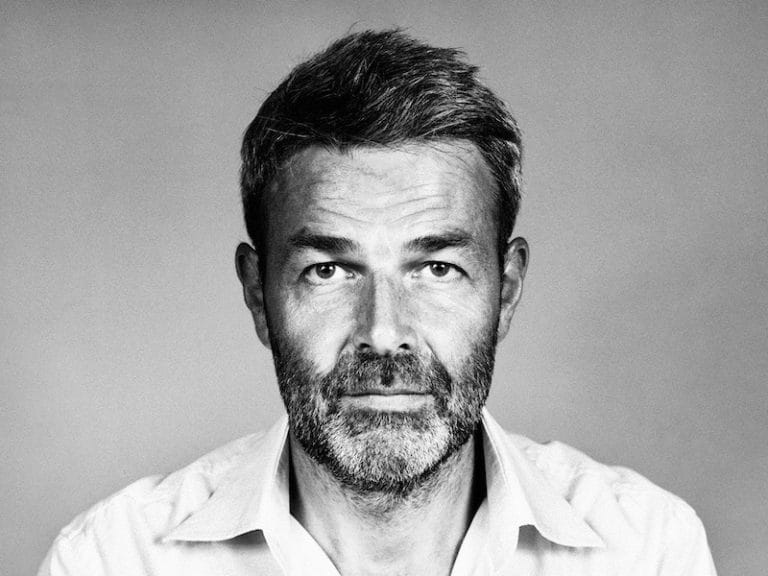 Professional male headshot for music industry expert, digital marketing, or artist promotion, emphasizing credibility and creativity in the music business.