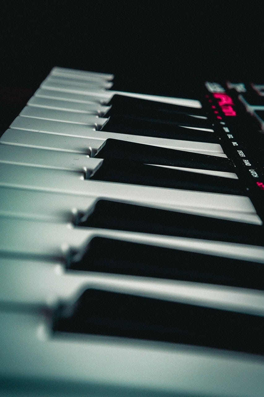 Keyboard instrument close-up digital synthesizer music equipment for music production and electronic sound design.