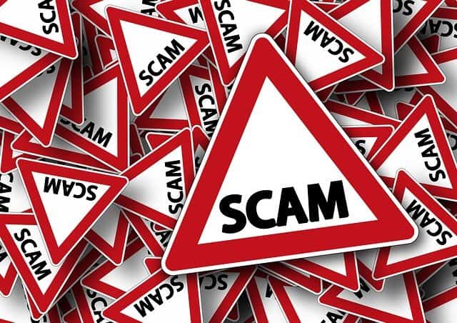Scam warning signs, warning alert, cybersecurity alert, digital safety, online scam detection, fraud prevention, warning triangle, cyber threat awareness, online security warning, scam alert signs.