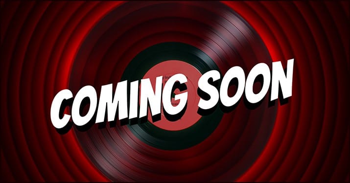 COMING SOON close-up of a vinyl record with bold "Coming Soon" text over a red and black hypnotic background, representing music release or entertainment industry updates.