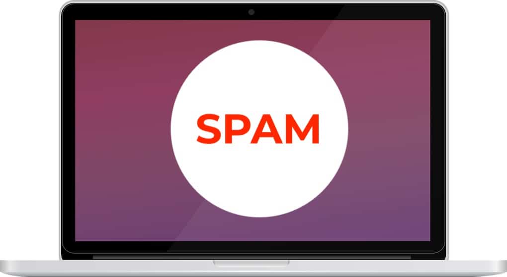 Unwanted spam email alert on a laptop screen with the word "SPAM" in bold red text, illustrating spam and cybersecurity issues.