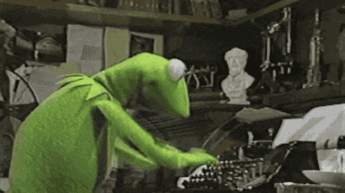 A green puppet character working at a DJ console, with a cluttered background and a bust sculpture, is depicted in a playful scene related to music or entertainment.